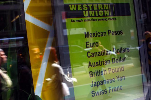 Gewaltiger Geldstrom: Schild in einer Western-Union-Filile. (29. März 2009)