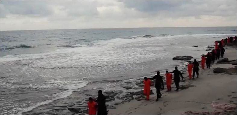 Ausschnitt aus einem Video, das IS-Anhänger aus Libyen gedreht haben sollen. Die Echtheit des Videos konnte die Agentur AP zunächst nicht bestätigen. Ausschnitt aus einem Video, das IS-Anhänger aus Libyen gedreht haben sollen. Die Echtheit des Videos konnte die Agentur AP zunächst nicht bestätigen.