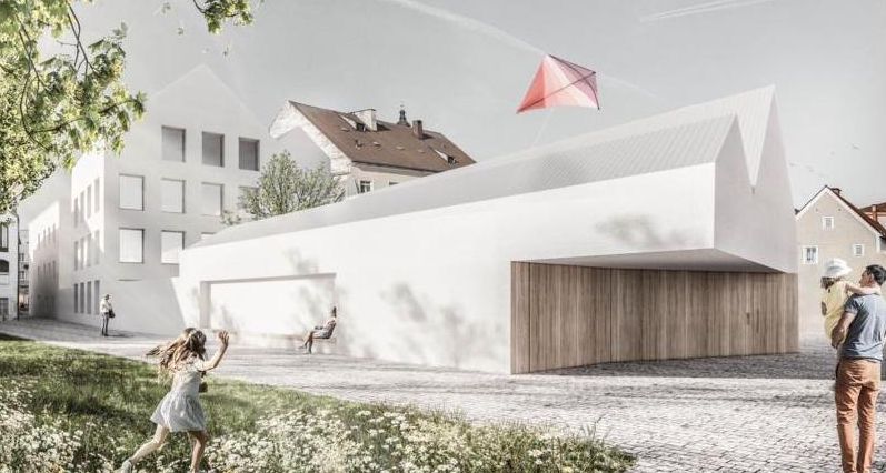 Der Siegerentwurf schlägt eine Gliederung in drei Bauten vor, hier die Ansicht vom Hof samt Blumenwiese, wie sie idyllischer, familienfreundlicher und vergesslicher kaum denkbar ist (Marte. Marte Architekten). 