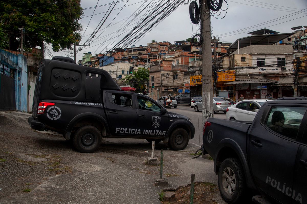 Police officers at the entrance to a favela in Rio de Janeiro.