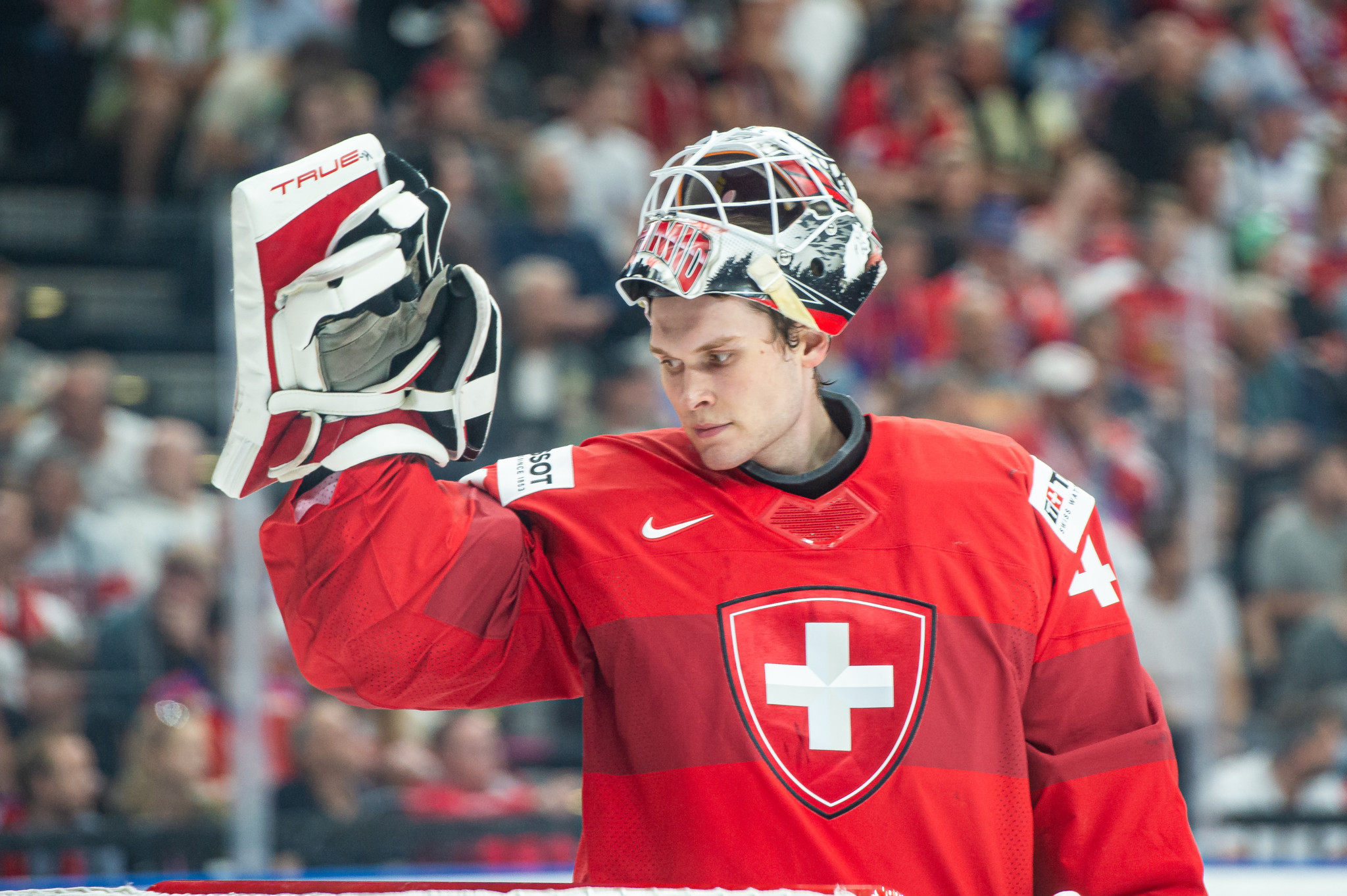PRAGUE, CZECH REPUBLIC - MAY 15: Goalie Akira Schmid #40 of Switzerland takes a breather and some water during the preliminary round match between Switzerland and Great Britain at Prague Arena on May 15, 2024 in Prague, Czech Republic. (Photo by RvS.Media/Monika Majer/Getty Images)