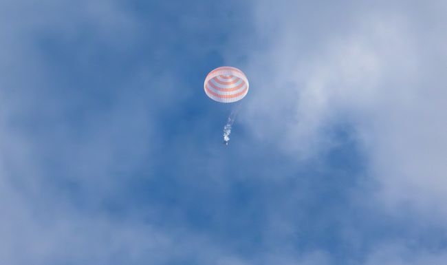 This handout photograph taken and released by NASA on September 27, 2023, shows the Soyuz MS-23 capsule carrying the International Space Station (ISS) crew of Russian cosmonauts Sergey Prokopyev, Dmitri Petelin and NASA astronaut Frank Rubio during its' landing in a remote area outside the town of Dzhezkazgan, Kazakhstan. (Photo by Bill INGALLS / NASA / AFP) / RESTRICTED TO EDITORIAL USE - MANDATORY CREDIT "AFP PHOTO / NASA/Bill Ingalls " - NO MARKETING NO ADVERTISING CAMPAIGNS - DISTRIBUTED AS A SERVICE TO CLIENTS