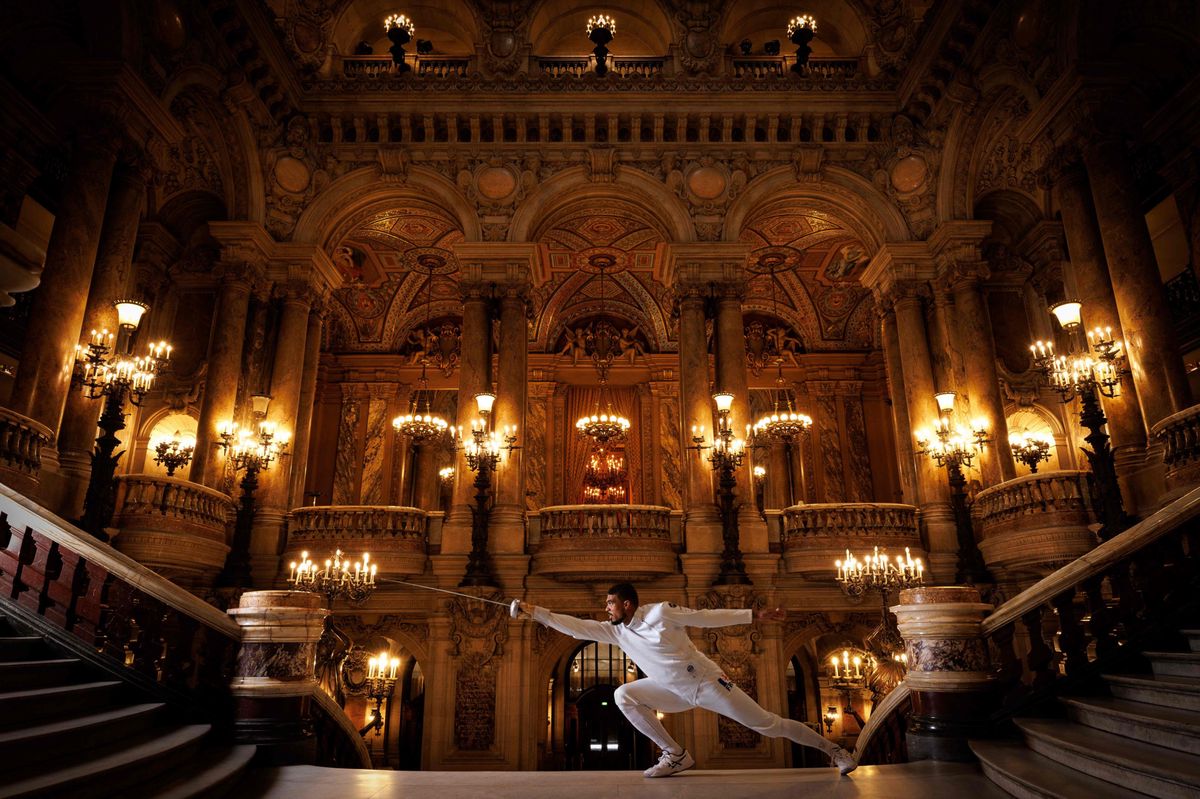 Swordsman Yannick Borel draws his sword at the Opera Garnier in Paris.