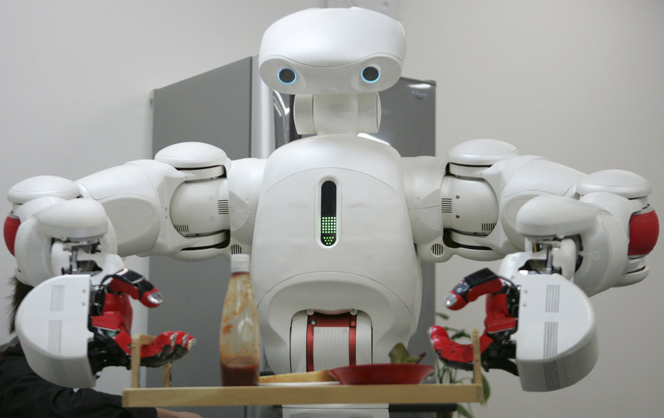 «Twendy-One» bringt das Frühstück ans Bett: Die Hände des Roboters haben vier menschenähnliche Finger, um Objekte  zu tragen. (27. November 2007)