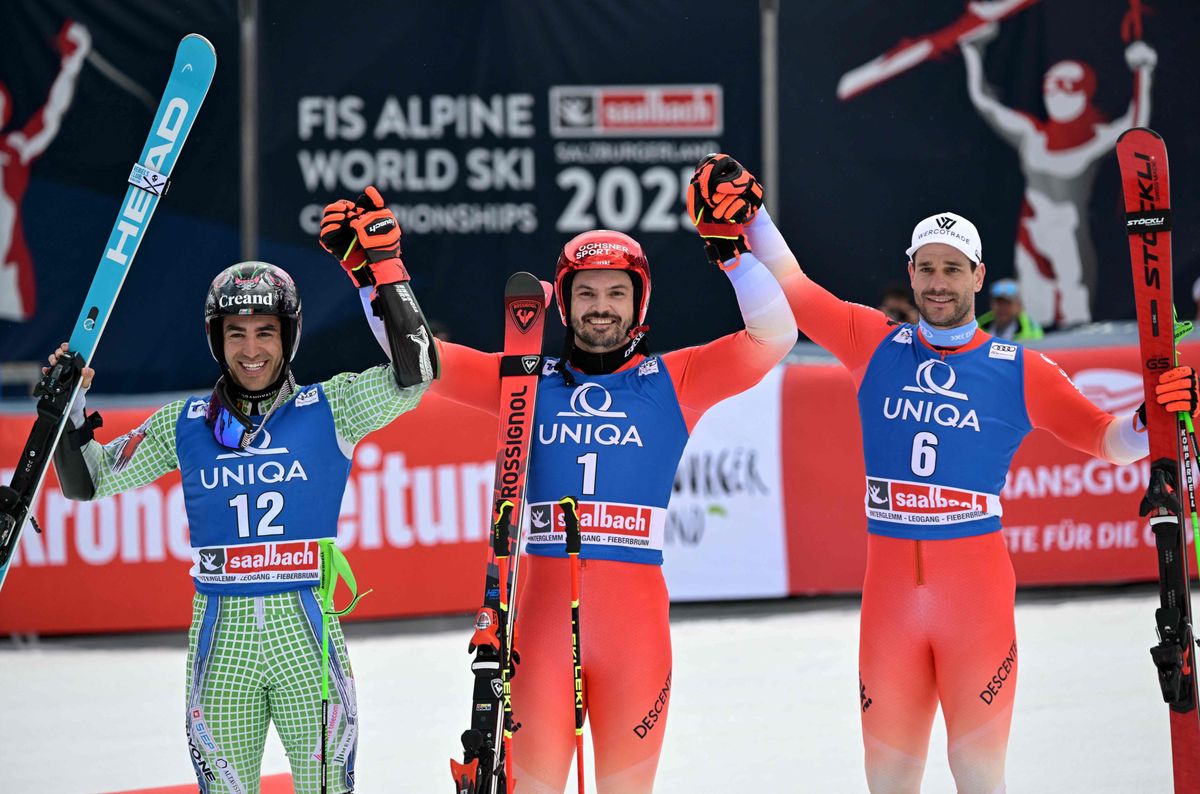 (L-R) Second placed Andorra's Joan Verdu, winner Switzerland's Loic Meillard and third placed Switzerland's Thomas Tumler celebrate after the men's Giant Slalom event of FIS Ski Alpine World Cup in Saalbach, Austria on March 16, 2024. (Photo by Joe Klamar / AFP)