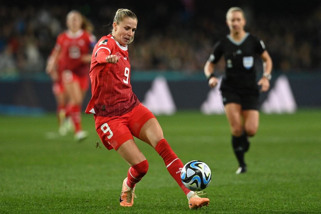 Switzerland's forward #09 Ana-Maria Crnogorevic passes the ball during the Australia and New Zealand 2023 Women's World Cup Group A football match between Switzerland and New Zealand at Dunedin Stadium in Dunedin on July 30, 2023. (Photo by Sanka Vidanagama / AFP)