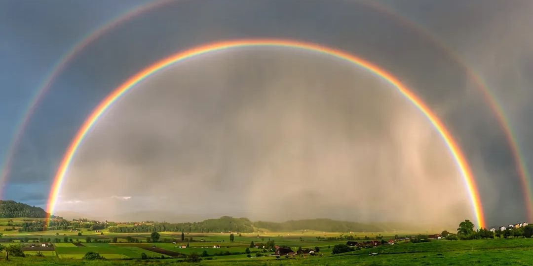 Gürbetal: Double rainbow enchants evening sky