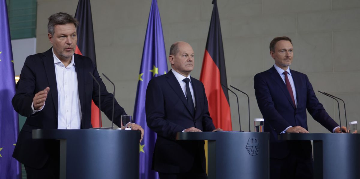 BERLIN, GERMANY - NOVEMBER 15: German Chancellor Olaf Scholz (C), Finance Minister Christian Lindner (R) and Economy Minister Robert Habeck give statements to the media following the weekly government cabinet meeting on November 15, 2023 in Berlin, Germany. The topic was a ruling by the German Constitutional Court declaring that the coalition government's shift of federal money in 2021 originally earmarked to alleviate the consequences of the coronavirus pandemic and that had gone unused towards climate change mitigation measures was unlawful. (Photo by Sean Gallup/Getty Images)