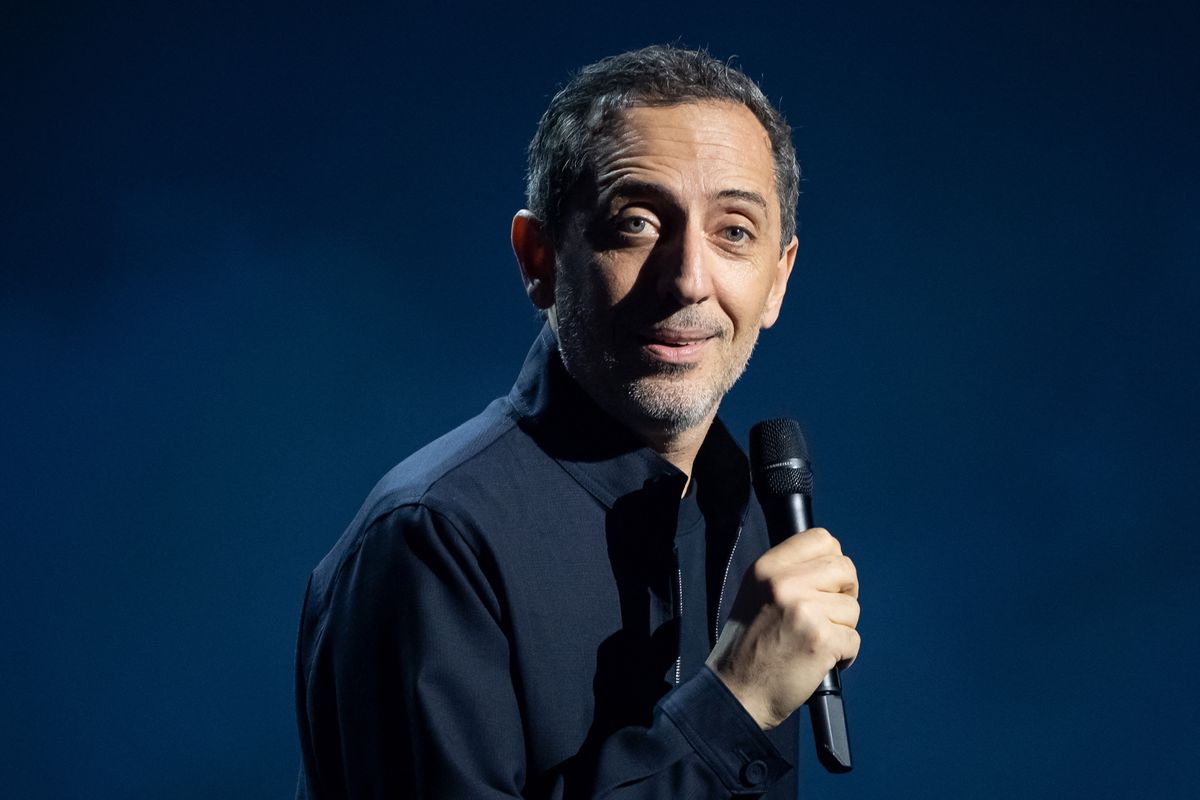 French actor and humorist Gad Elmaleh performs on stage with "D'ailleurs", his new show at Le Dome de Paris - Palais des Sports, in Paris on February 8, 2022. The show will run from February 8 to February 26, 2022. (Photo by BERTRAND GUAY / AFP)