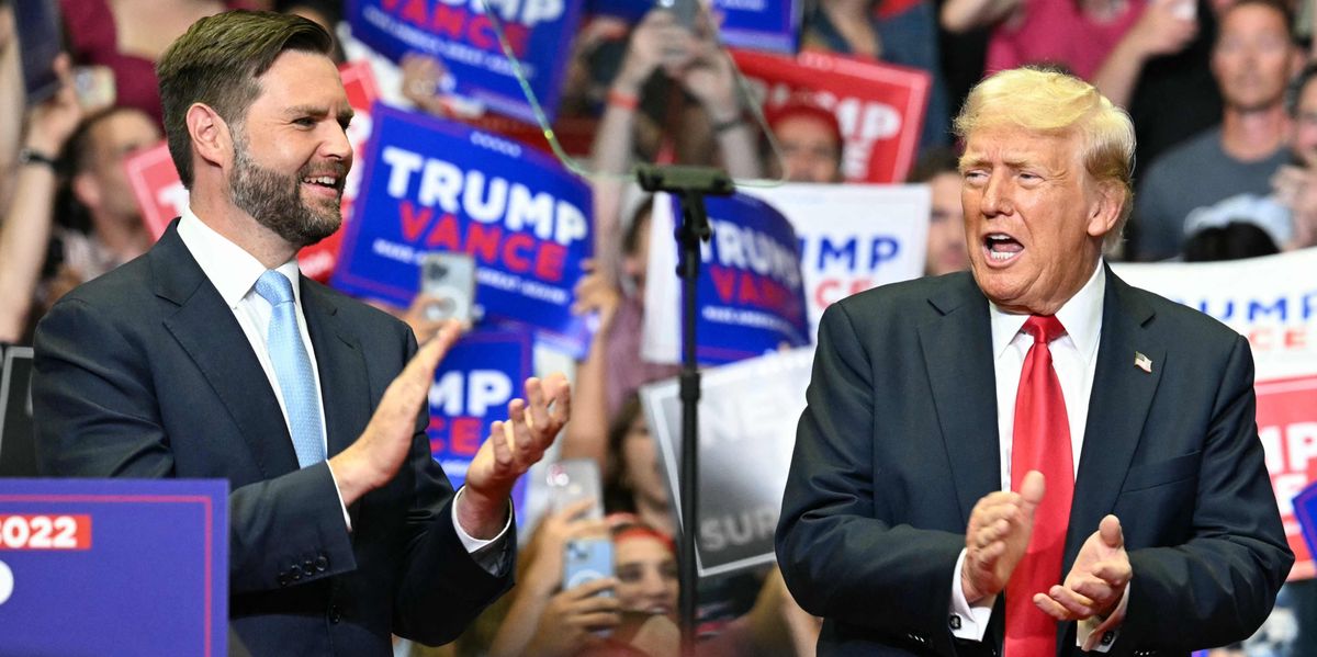 TOPSHOT - Former US President and 2024 presidential nominee Donald Trump (R) with US Senator and vice presidential nominee J.D. Vance attend their first campaign rally together at Van Andel Arena in Grand Rapids, Michigan, on July 20, 2024. (Photo by Jim WATSON / AFP)
