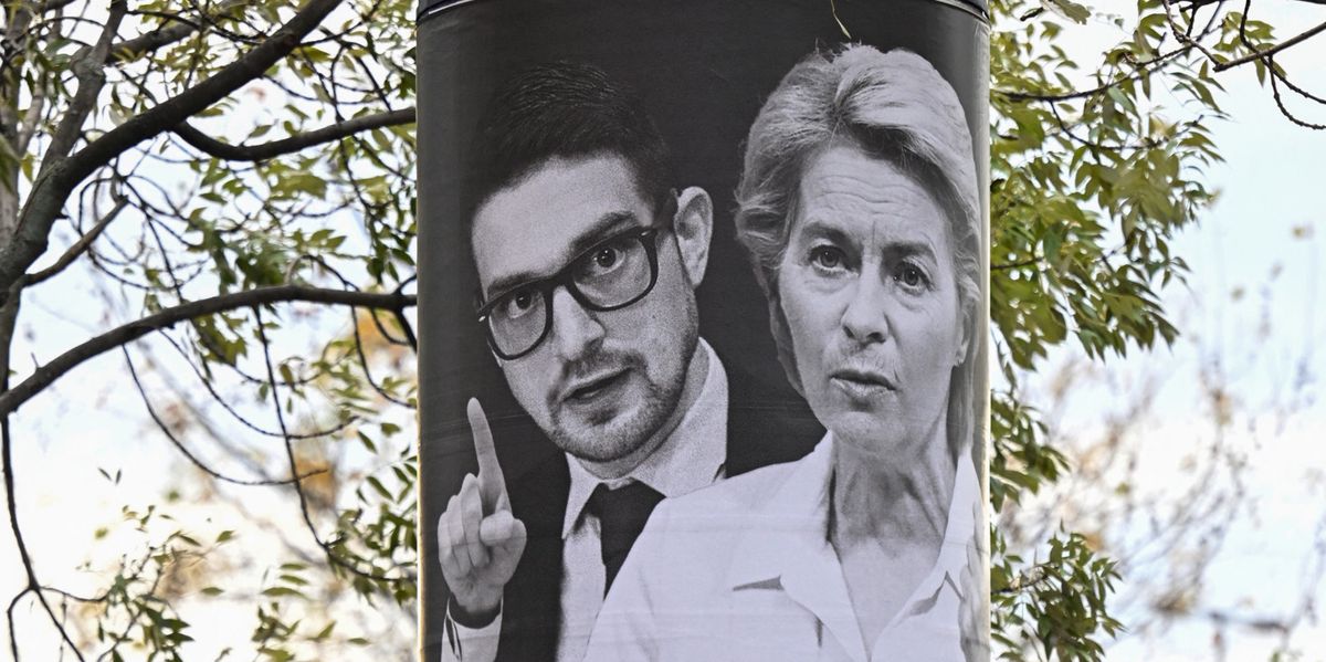 A poster showing European Commission President Ursula von der Leyen and Alexander Soros, son of Hungarian-US billionaire George Soros, with the lettering 'Don't dance as they whistle! National consultation' is seen on an advertising column in Budapest on November 20, 2023. The Hungarian government on November 17, 2023 launched a "national consultation" billed as "protecting" the country against alleged European Union policies, including war-torn Ukraine’s potential membership of the bloc. Prime Minister Orban's nationalist government has, since 2015, frequently used such questionnaires, backed by extensive multimedia campaigns, to claim legitimacy for its positions and to attack EU policies. (Photo by ATTILA KISBENEDEK / AFP)