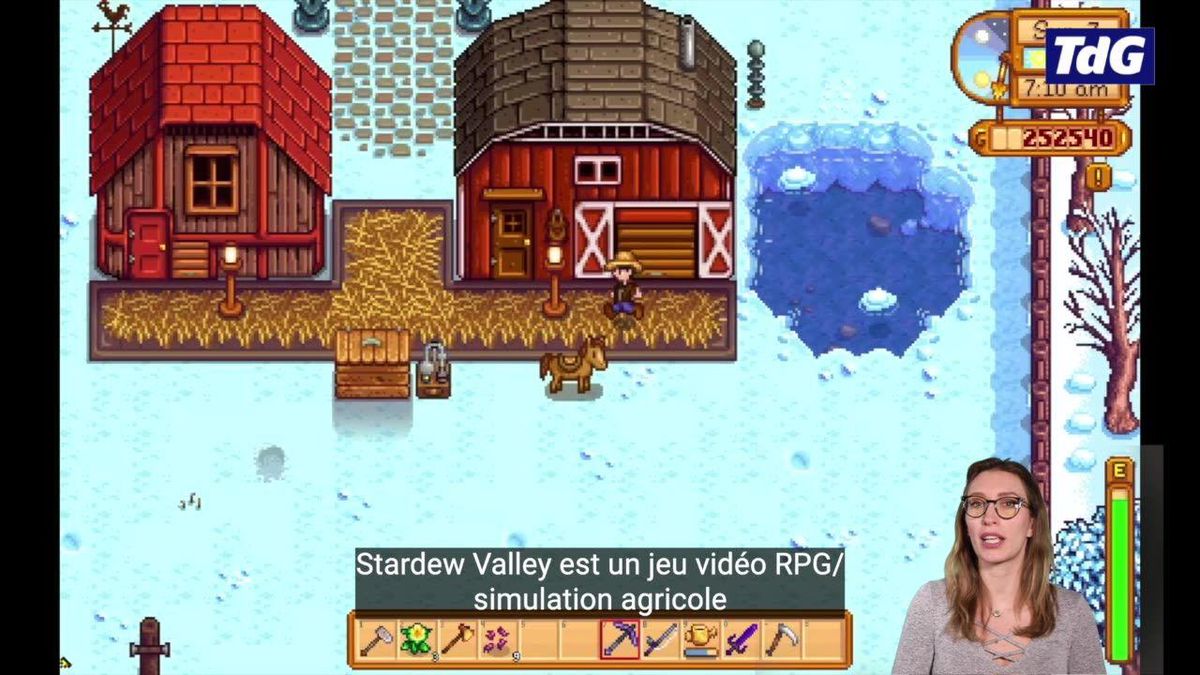 Une femme devant un jeu video