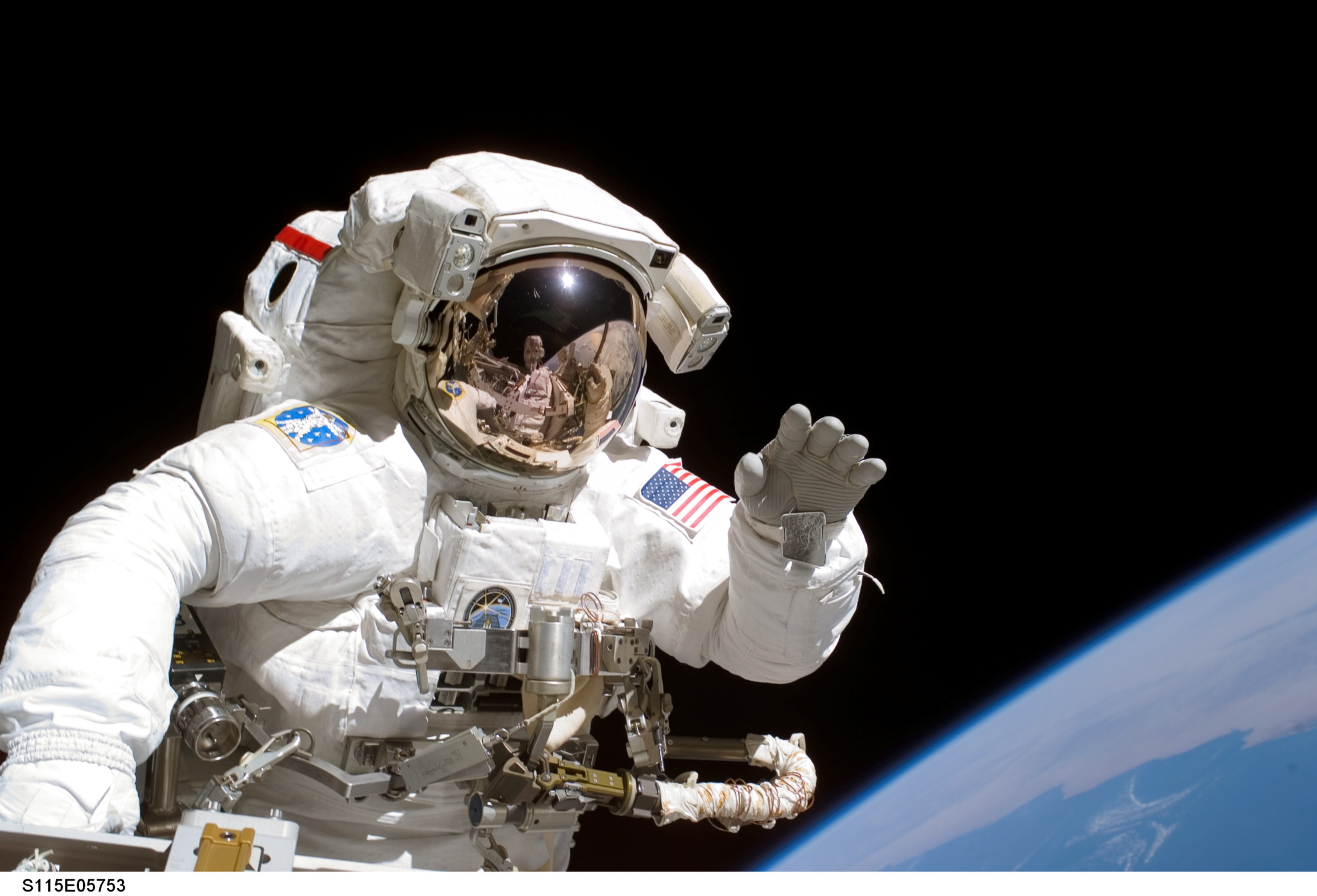 n this image provided by NASA Thursday, Sept. 14, 2006, astronaut Joseph R. Tanner, STS-115 mission specialist, waves toward the digital still camera of his space walk colleague, astronaut Heidemarie M. Stefanyshyn-Piper as the two share extravehicular activity (EVA) duties during the first of three scheduled spacewalks . The STS-115 astronauts and the Expedition 13 crew members are joining efforts this week to resume construction of the International Space Station. (KEYSTONE/AP Photo/NASA)