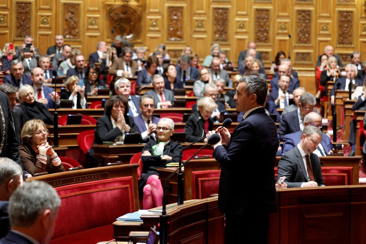 French Interior Minister Gerald Darmanin addresses the Senate during a voting session on an immigration bill at the French Senate in Paris on November 14, 2023. The government said its hugely controversial immigration bill will bolster security for legal migrants but opponents see it as new evidence of a lurch to the right by French President. (Photo by Geoffroy VAN DER HASSELT / AFP)