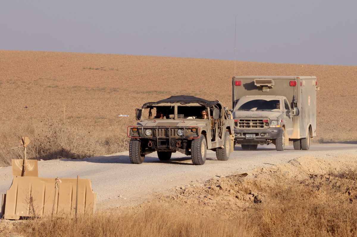 Israeli military vehicles travel along Israel's southern border on June 13, 2024.