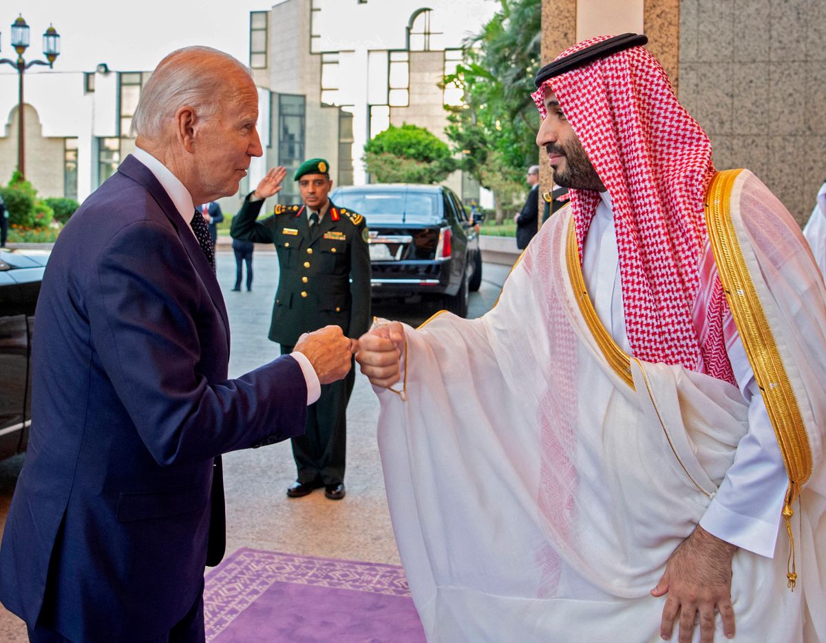 A handout picture released by the Saudi Royal Palace on July 15, 2022, shows Saudi Crown Prince Mohammed bin Salman (R) bumps fists with US President Joe Biden at Al-Salam Palace in the Red Sea port of Jeddah. (Photo by Bandar AL-JALOUD / Saudi Royal Palace / AFP) / RESTRICTED TO EDITORIAL USE - MANDATORY CREDIT "AFP PHOTO / MEDIA OFFICE OF MOHAMMED BIN SALMAN /BANDAR ALGALOUD" - NO MARKETING NO ADVERTISING CAMPAIGNS - DISTRIBUTED AS A SERVICE TO CLIENTS