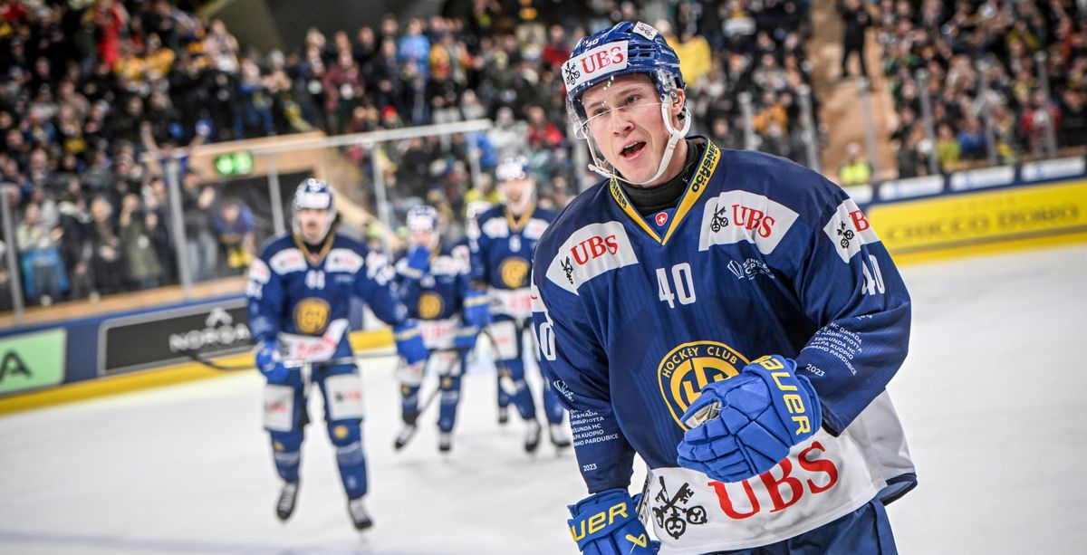 Davos' Denis Rasmussen celebrate after scoring 1-0 during the game between HC Davos from Switzerland and HC Dynamo Pardubice from Czech Republic at the Final of the 95th Spengler Cup ice hockey tournament in Davos, Switzerland, Sunday, Dec. 31, 2023. (Melanie Duchene/Keystone via AP)