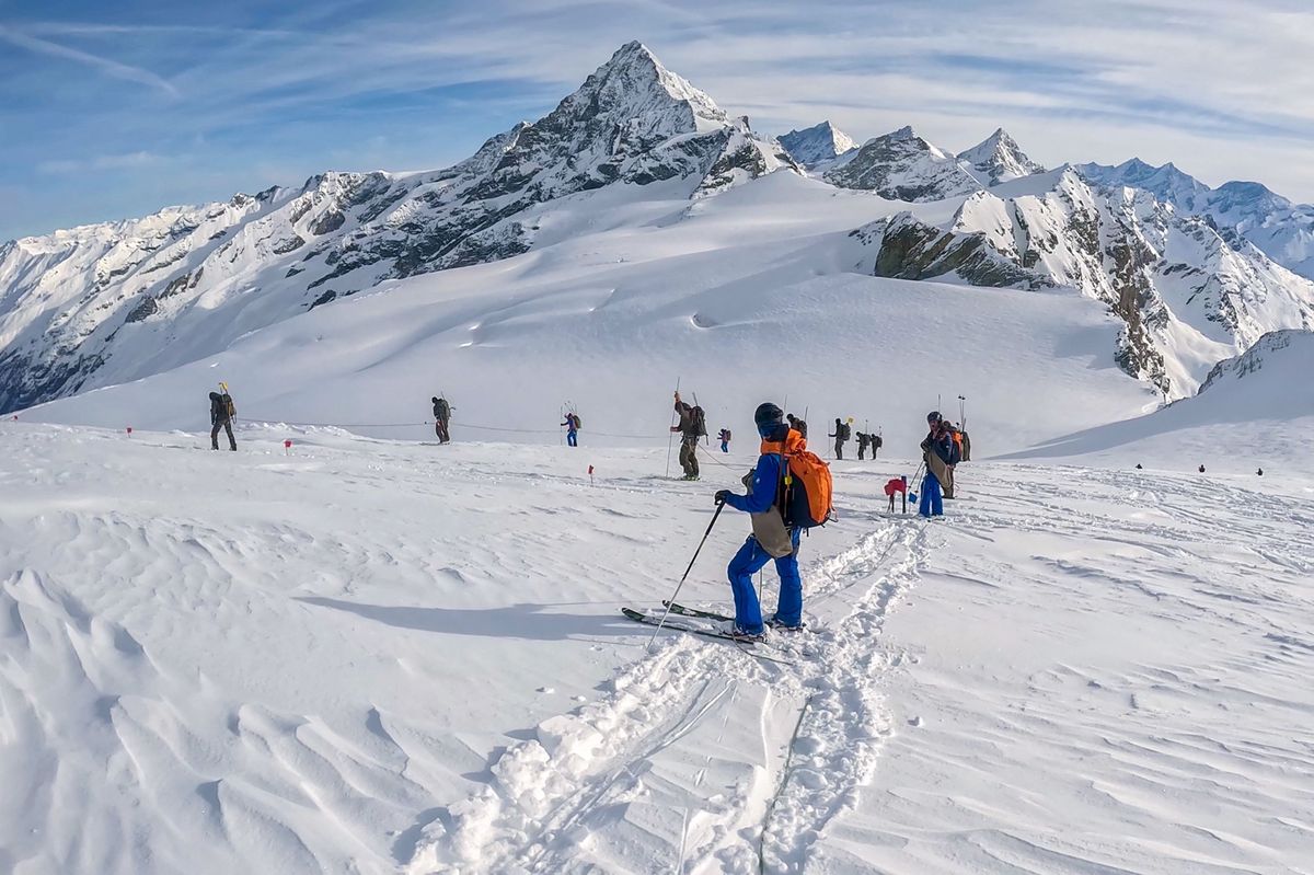 This handout picture taken from a video on March 14, 2024 by the Police Cantonale Valaisanne (Police of the Canton of Valais) at the Tete Blanche hight altitude shows search operations for the last member of a group of six cross-country skiers who went missing in the Swiss Alps over last weekend. Five person have been found dead already. Search operations for the last person has been suspended, the Police said on March 14. (Photo by Handout / POLICE CANTONALE VALAISANNE / AFP) / RESTRICTED TO EDITORIAL USE - MANDATORY CREDIT "AFP PHOTO /POLICE CANTONALE VALAISANNE"- NO MARKETING NO ADVERTISING CAMPAIGNS - DISTRIBUTED AS A SERVICE TO CLIENTS