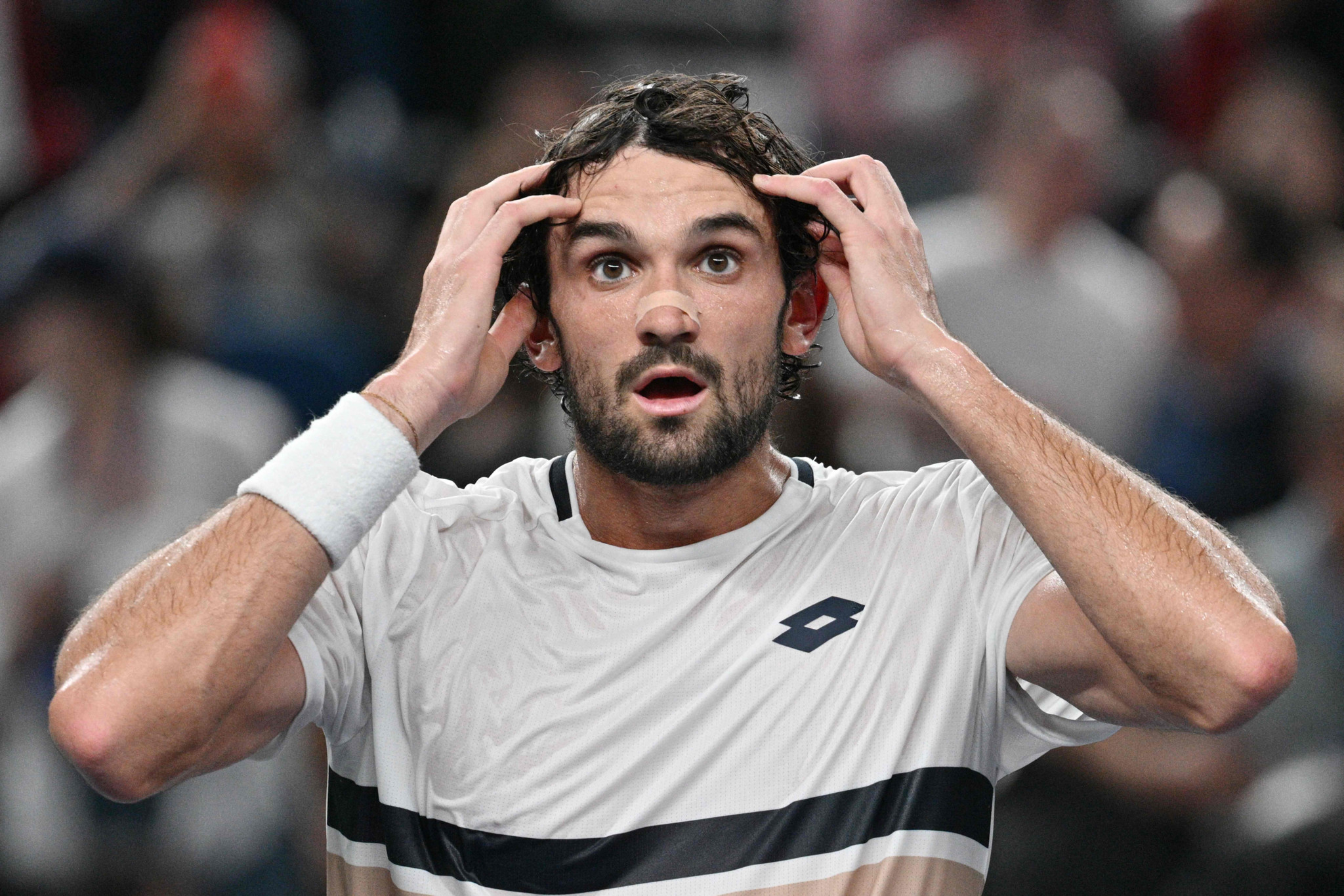 Ranked 204th Vacherot stuns Djokovic