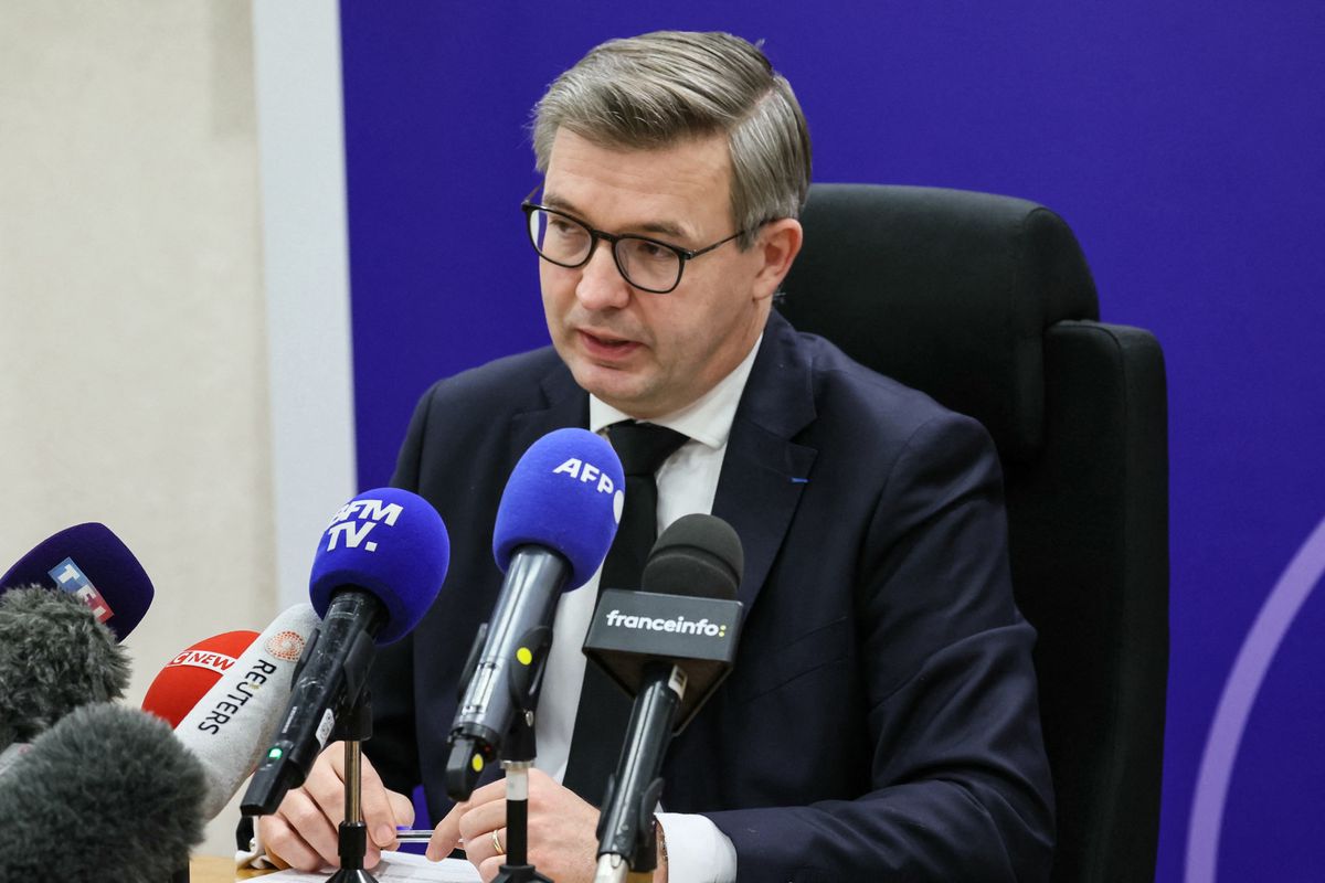 Meaux's Public Prosecutor Jean-Baptiste Bladier speaks during a press conference following the discovery of the bodies of a woman and her four children in their flat, in Meaux, eastern Paris, on December 26, 2023. French police arrested a man, the father, suspected of murdering his wife and their four children aged nine months, four, seven and 10 years old, opening an inquiry into their "premeditated murder", in Meaux, eastern Paris, on December 26, 2023. (Photo by ALAIN JOCARD / AFP)