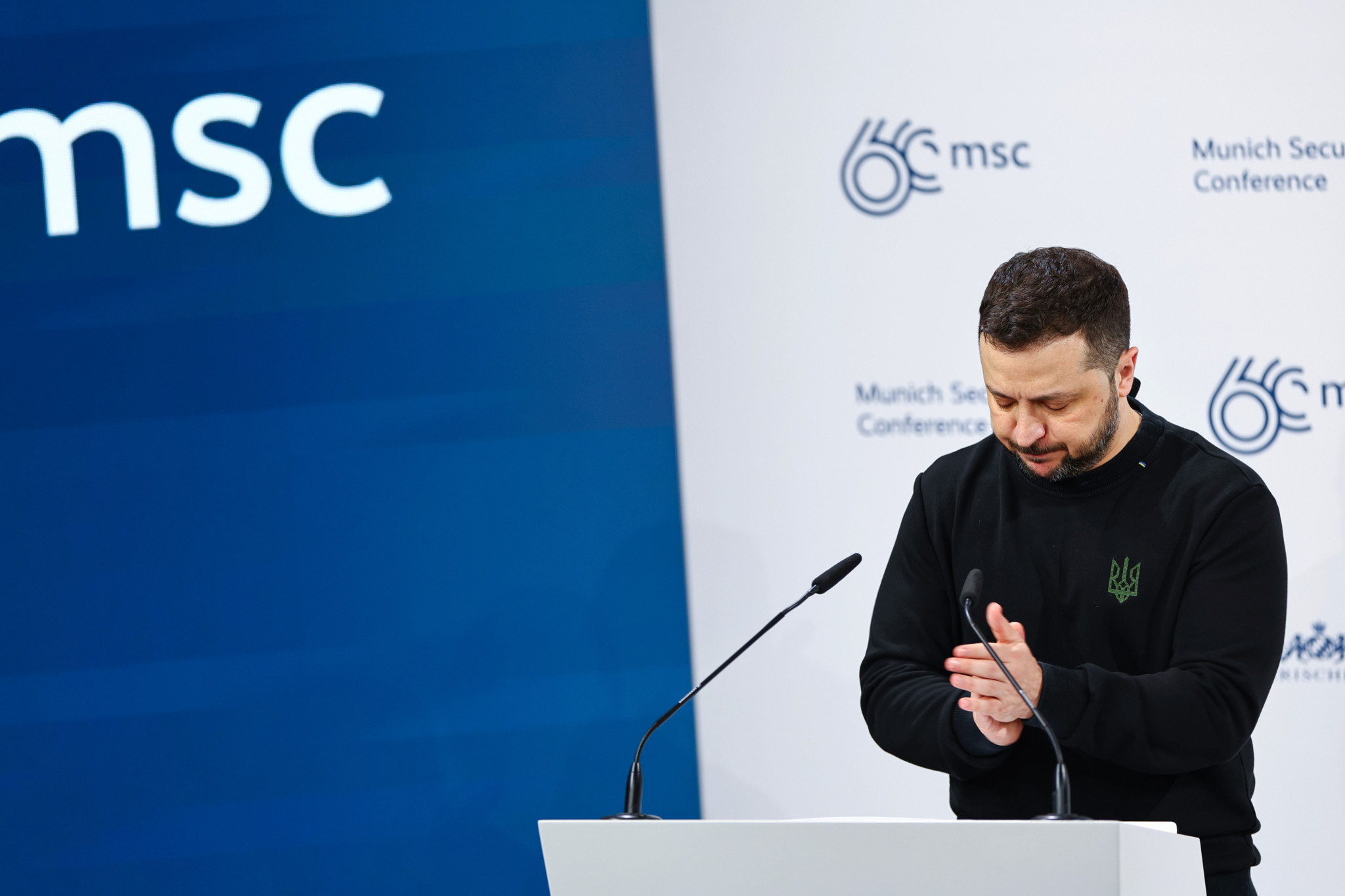 epa11160055 Ukrainian President Volodymyr Zelensky reacts as he delivers a speech at the 'Bayerischer Hof' hotel, the venue of the 60th Munich Security Conference (MSC), in Munich, Germany, 17 February 2024. More than 500 high-level international decision-makers meet at the 60th Munich Security Conference in Munich during their annual meeting from 16 to 18 February 2024 to discuss global security issues.  EPA/ANNA SZILAGYI