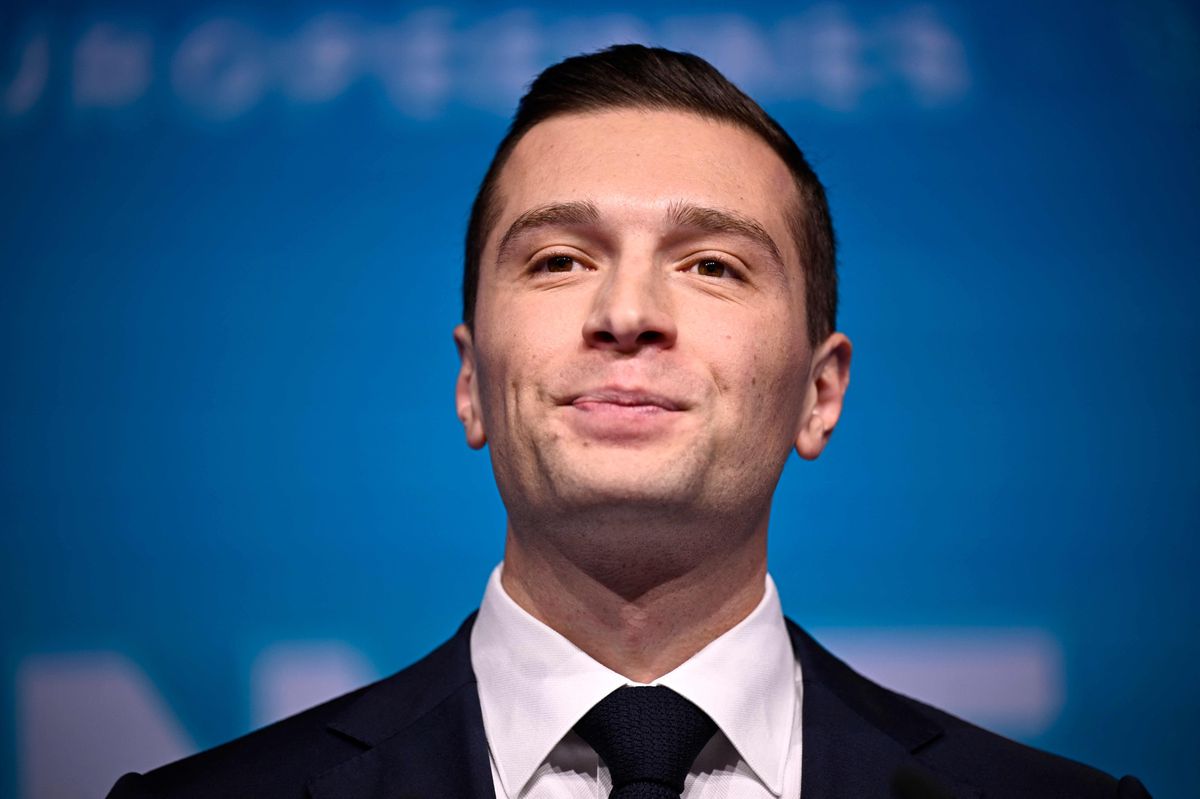 French far-right Rassemblement National (RN) party president Jordan Bardella addresses militants after the first results announcement during an evening gathering of French far-right party Rassemblement National (RN) on the final day of the European Parliament election, at the Pavillon Chesnaie du Roy in Paris, on June 9, 2024. (Photo by JULIEN DE ROSA / AFP)