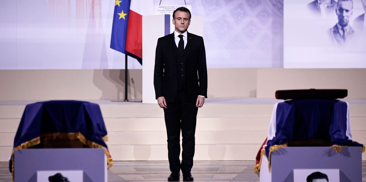 French President Emmanuel Macron pays his respects at the coffins of Missak Manouchian, and his wife Mélinée in the Pantheon monument during their induction ceremony, Wednesday, Feb 21, 2024 in Paris. While France hosts grandiose ceremonies commemorating D-Day, Missak Manouchian and his Resistance fighters' heroic role in World War II are often overlooked. A communist, poet who took refuge in France after surviving the Armenian genocide, Manouchian was executed in 1944 for leading the resistance to Nazi occupation. (Christophe Petit Tesson/Pool via AP)