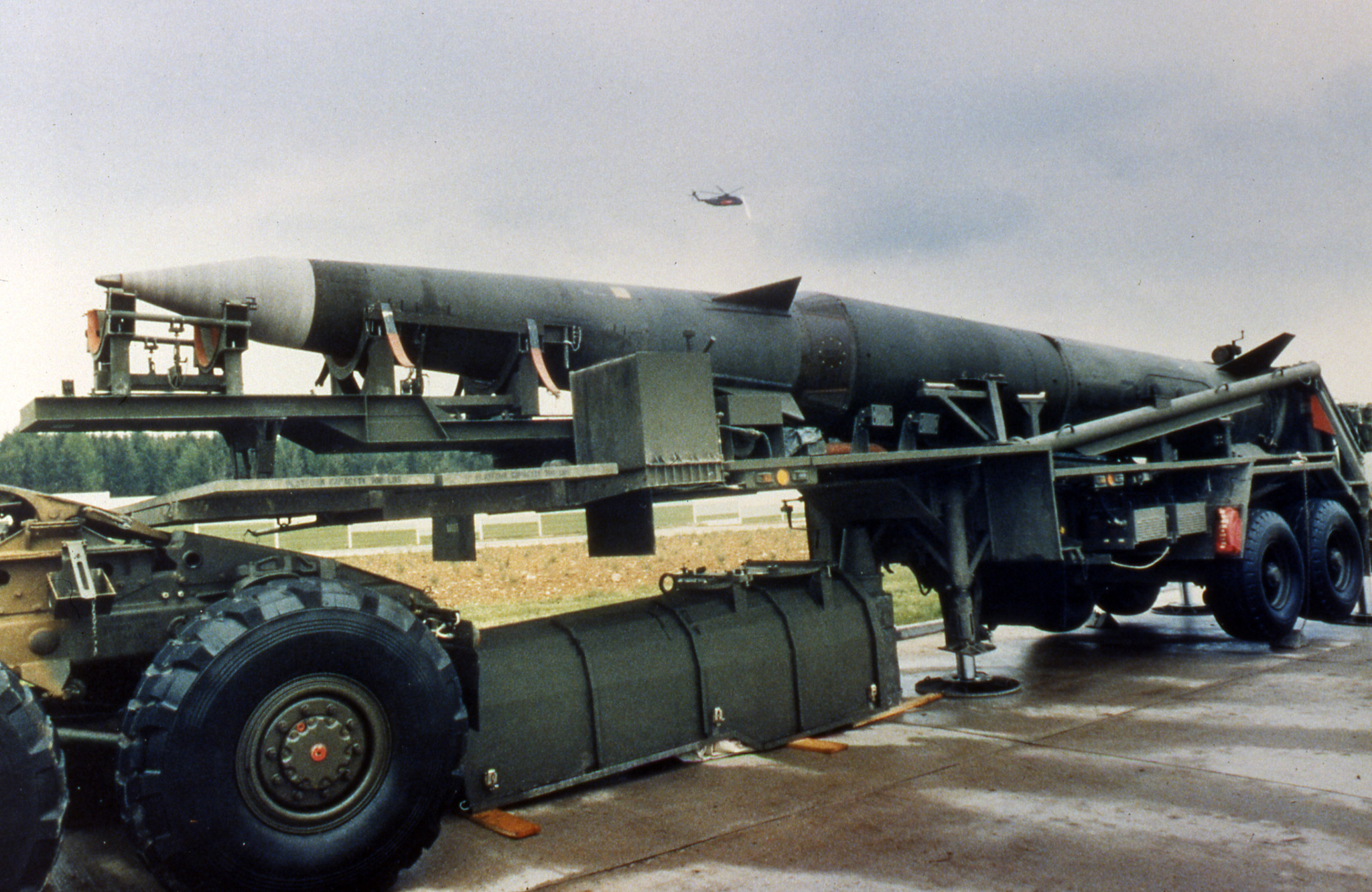 A Pershin II missile is seen on a semi-trailer at the Mutlangen, West Germany, US missile base, as the press was given a chance to inspect the army base May 20, 1987. Since 1963, Pershing I, Pershing Ia and since 1983 Pershing II missiles hhave been deployed here. since the stationing of the Pershing II this base has frequently been the target of anti-nuclear and peace  demonstrations and road blockades. (AP Photo/Thomas Kienzle)