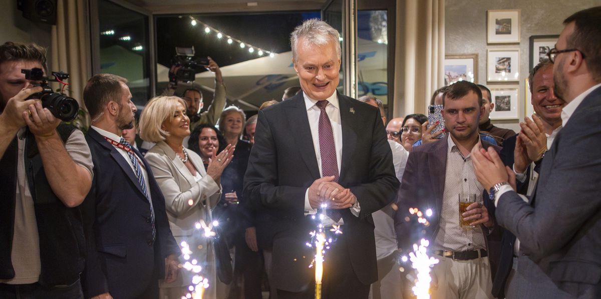 Lithuania's President Gitanas Nauseda, a presidential candidate, center, celebrates winning the second round of Lithuania's presidential election, in Vilnius, Lithuania, late Sunday, May 26, 2024. (AP Photo/Mindaugas Kulbis)
Gitanas Nauseda