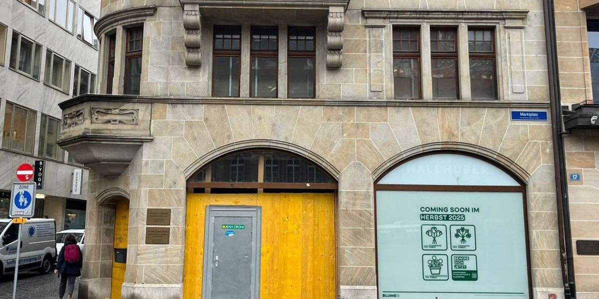 Blume-2000-am-Marktplatz-Er-ffnung-verz-gert-sich-Jetzt-m-ssen-Basler-Angestellte-nach-Karlsruhe