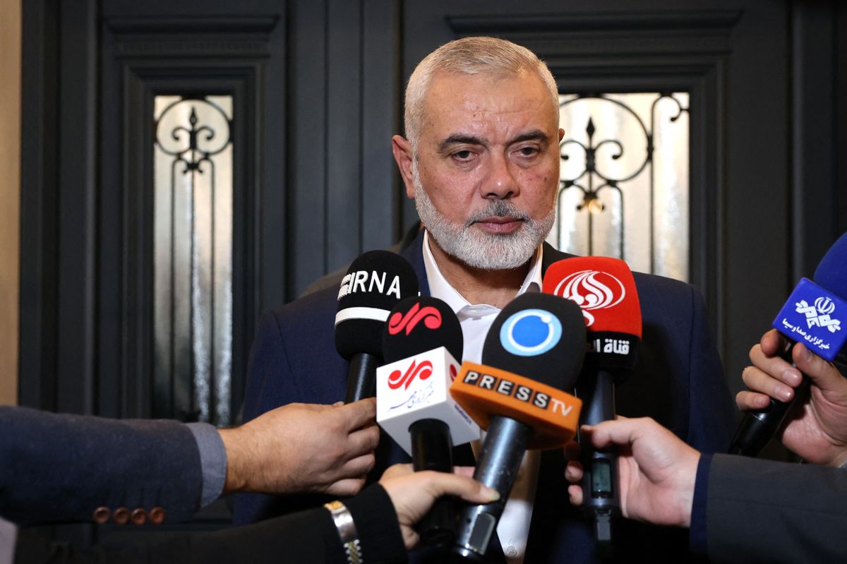 This handout picture provided by the Iranian foreign ministry on December 20, 2023, shows Qatar-based Hamas leader Ismail Haniyeh speaking to journalists as he welcomes the Iranian foreign minister (not in the picture), in Doha. (Photo by Iranian Foreign Ministry / AFP) / XGTY / XGTY / === RESTRICTED TO EDITORIAL USE - MANDATORY CREDIT "AFP PHOTO / HO / IRANIAN FOREIGN MINISTRY" - NO MARKETING NO ADVERTISING CAMPAIGNS - DISTRIBUTED AS A SERVICE TO CLIENTS ===