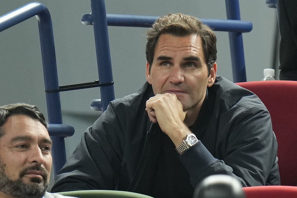 Retired tennis player Roger Federer watches the men's singles quarterfinal match play in between Andrey Rublev of Russia and Ugo Humbert of France in the Shanghai Masters tennis tournament at Qizhong Forest Sports City Tennis Center in Shanghai, China, Friday, Oct. 13, 2023. (AP Photo/Andy Wong)
