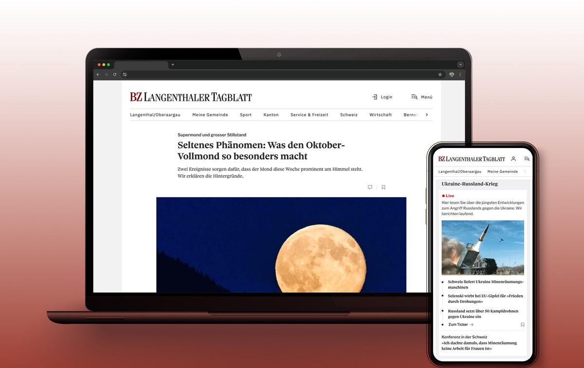 Laptop- und Smartphone-Bildschirm zeigen die Webseite der BZ Langenthaler Tagblatt mit einem Artikel über den Oktober-Vollmond, illustriert mit einem Bild des Vollmondes vor einem Hügel.