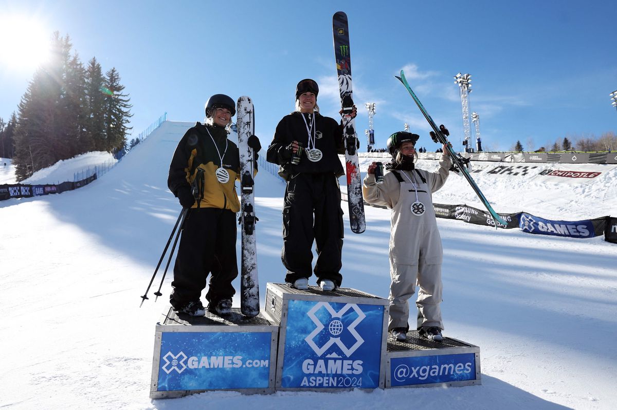 ASPEN, COLORADO - JANUARY 27: Rell Harwood of the USA (silver), Olivia Asselin or Canada (gold) and Sarah Hoefflin of Switzerland (bronze) pose on the podium after the Women's Ski Knuckle Huck finals on day 2 of the X Games Aspen 2024 on January 27, 2024 in Aspen, Colorado.   Jamie Squire/Getty Images/AFP (Photo by JAMIE SQUIRE / GETTY IMAGES NORTH AMERICA / Getty Images via AFP)