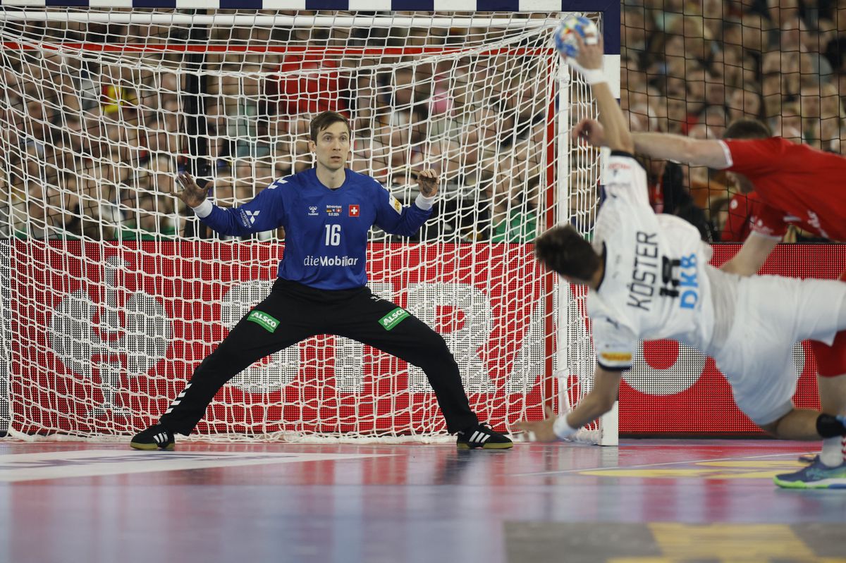Switzerland's goalkeeper #16 Nikola Portner follows the ball during the men's EURO 2024 EHF Handball European Championship match Group A between Germany and Switzerland in Dusseldorf, western Germany on January 10, 2024. (Photo by Odd ANDERSEN / AFP)