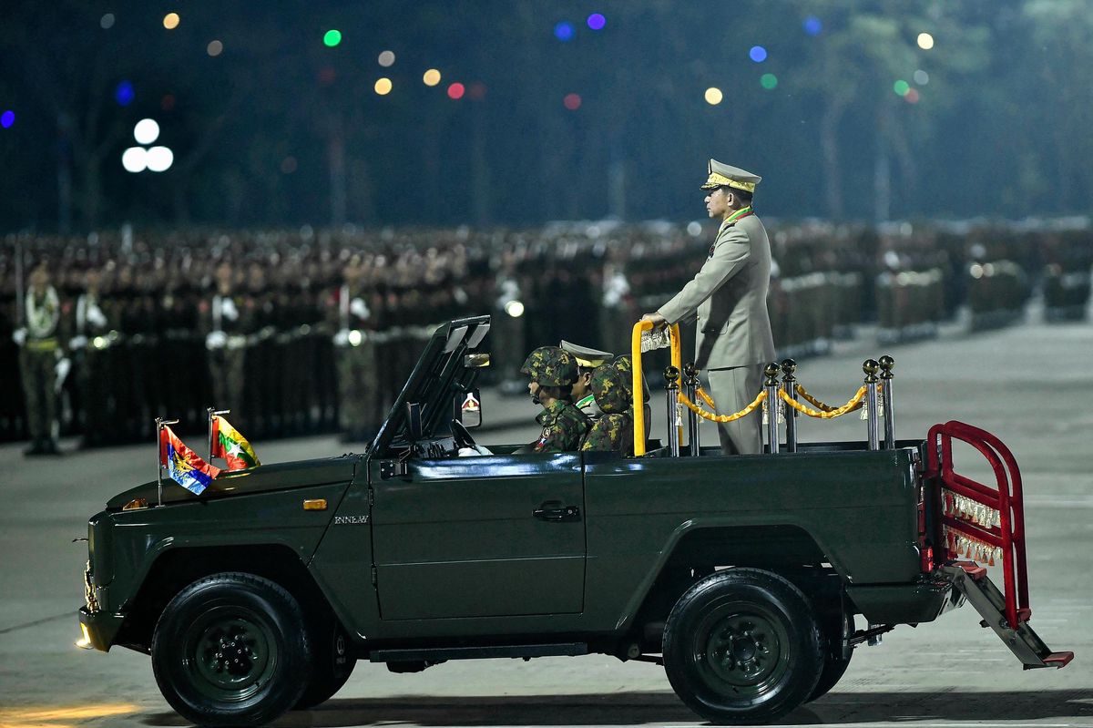 Myanmar's junta chief military Min Aung Hlaing arrives to deliver a speech during a ceremony to mark the country's Armed Forces Day in Naypyidaw on March 27, 2024. Myanmar's junta chief on March 27, 2024 blamed the country's growing armed resistance movement for preventing long-promised elections in a speech to thousands of soldiers following an Armed Forces Day parade. (Photo by AFP)
