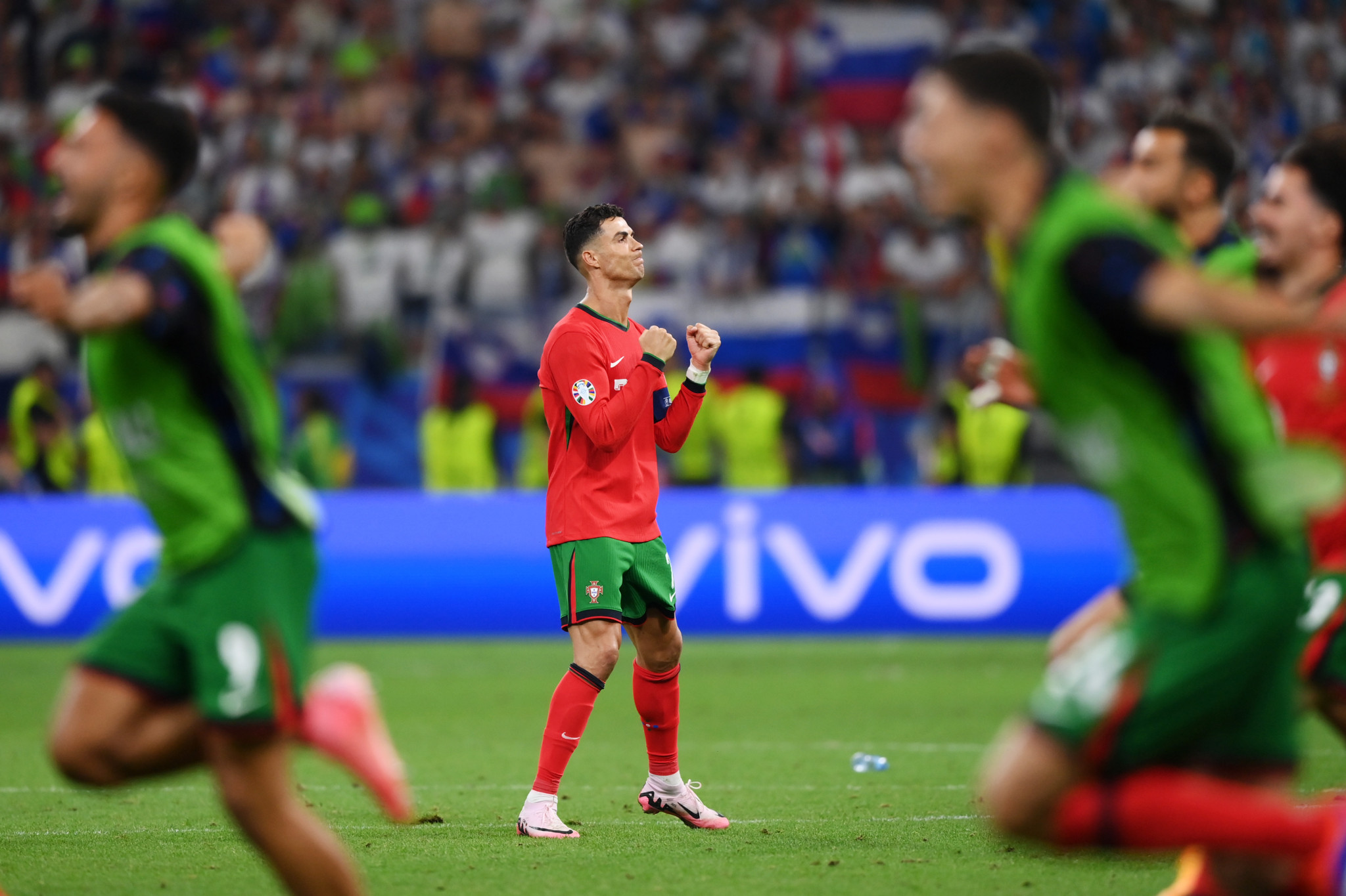 FRANKFURT AM MAIN, GERMANY - JULY 01: Cristiano Ronaldo of Portugal celebrates following the team's victory in the penalty shoot out during the UEFA EURO 2024 round of 16 match between Portugal and Slovenia at Frankfurt Arena on July 01, 2024 in Frankfurt am Main, Germany. (Photo by Justin Setterfield/Getty Images)