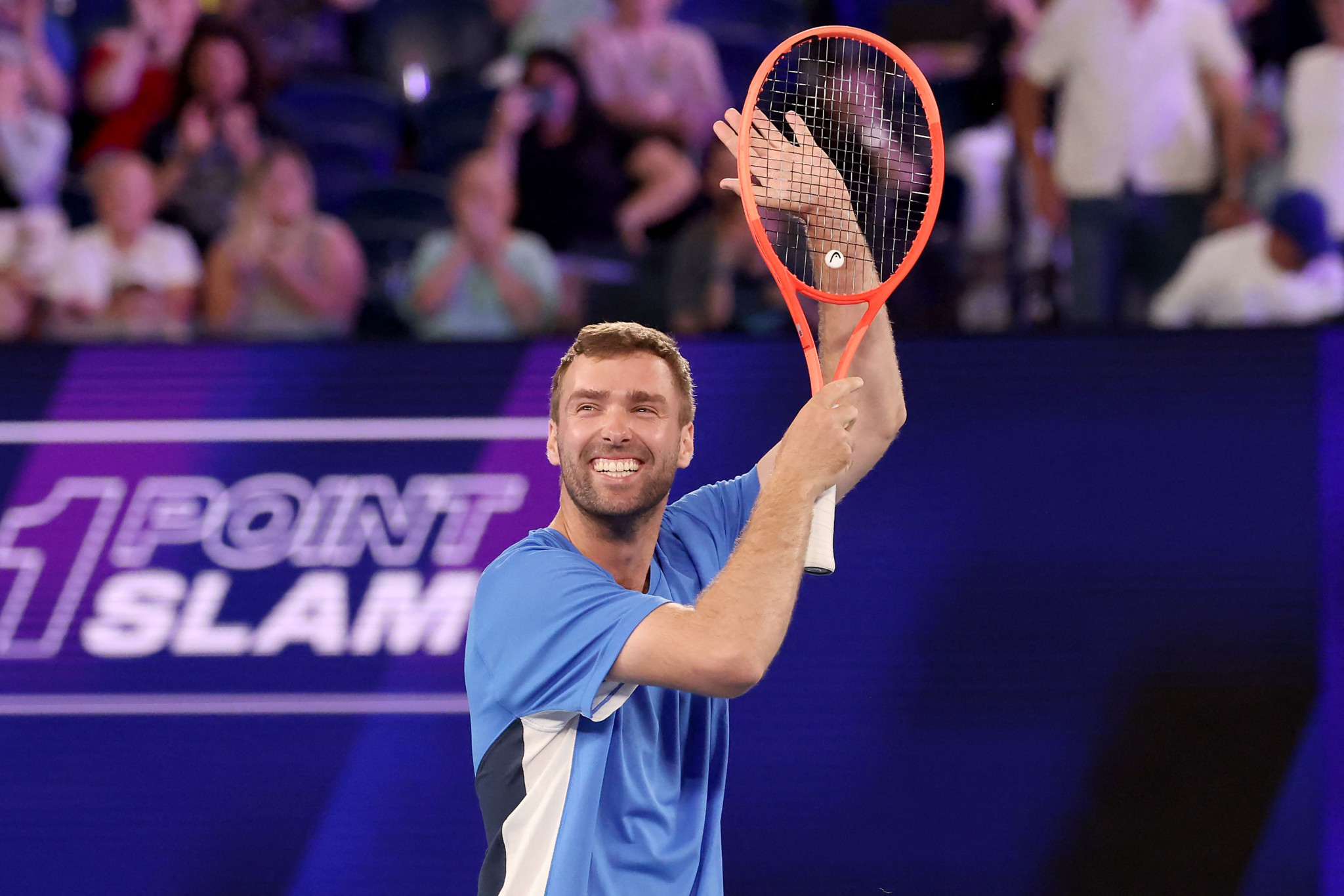 Australia's Jordan Smith celebrates after beating Taiwan's Joanna Garland in the 1 Point Slam exhibition event ahead of the 2026 Australian Open at Rod Laver Arena in Melbourne.