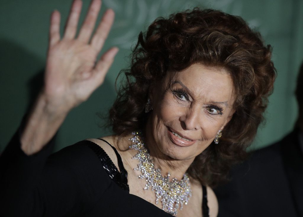 Actress Sophia Loren poses for photographers upon arrival at the Green Carpet Fashion Awards in Milan, Italy, Sunday, Sept. 22, 2019. (AP Photo/Luca Bruno)