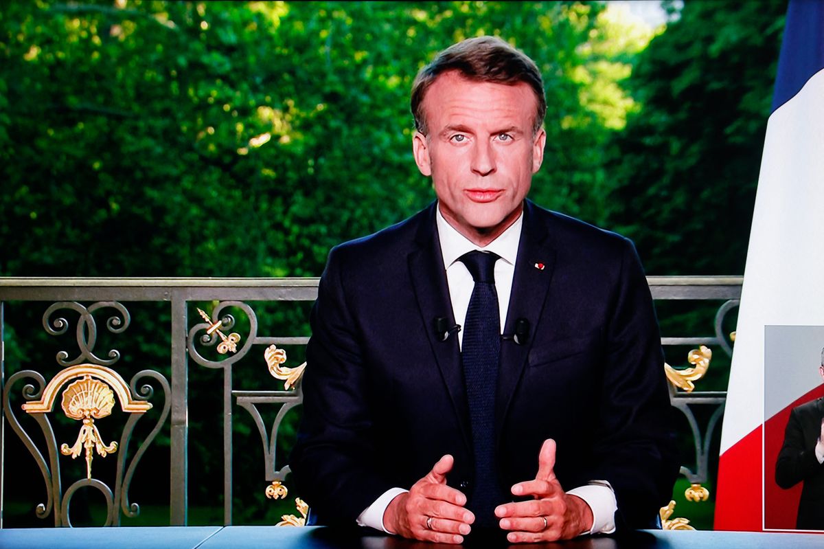 This screen shot shows France's President Emmanuel Macron speaking during a televised address to the nation during which he announced he is dissolving the National Assembly, French Parliament lower house, and calls new general elections on June 30, in Paris on June 9, 2024. (Photo by Ludovic MARIN / AFP)