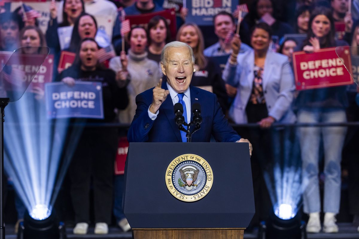epa11099795 US President Joe Biden speaks at a campaign rally for abortion rights at George Mason University in Manassas, Virginia, USA, 23 January 2024. The rally comes one day after the 51st anniversary of the Supreme Court's Roe v. Wade decision, which the high justices overturned in 2022.  EPA/JIM LO SCALZO