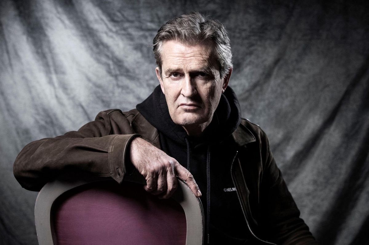 English actor Rupert Everett  poses during a photo session in Paris on November 27, 2018. (Photo by JOEL SAGET / AFP)