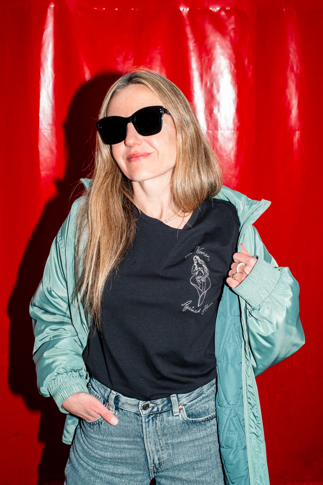 Sabina Gasser wears a shirt from her collaboration with Nina Egli. Proceeds will go to a Swiss women's shelter for victims of human trafficking.
