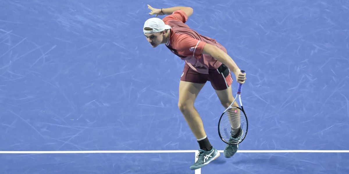 Switzerland's Dominic Stricker returns a ball to France's Ugo Humbert during their quarter finals match at the Swiss Indoors tennis tournament at the St. Jakobshalle in Basel, Switzerland, on Friday, October 27, 2023. (KEYSTONE/Georgios Kefalas)