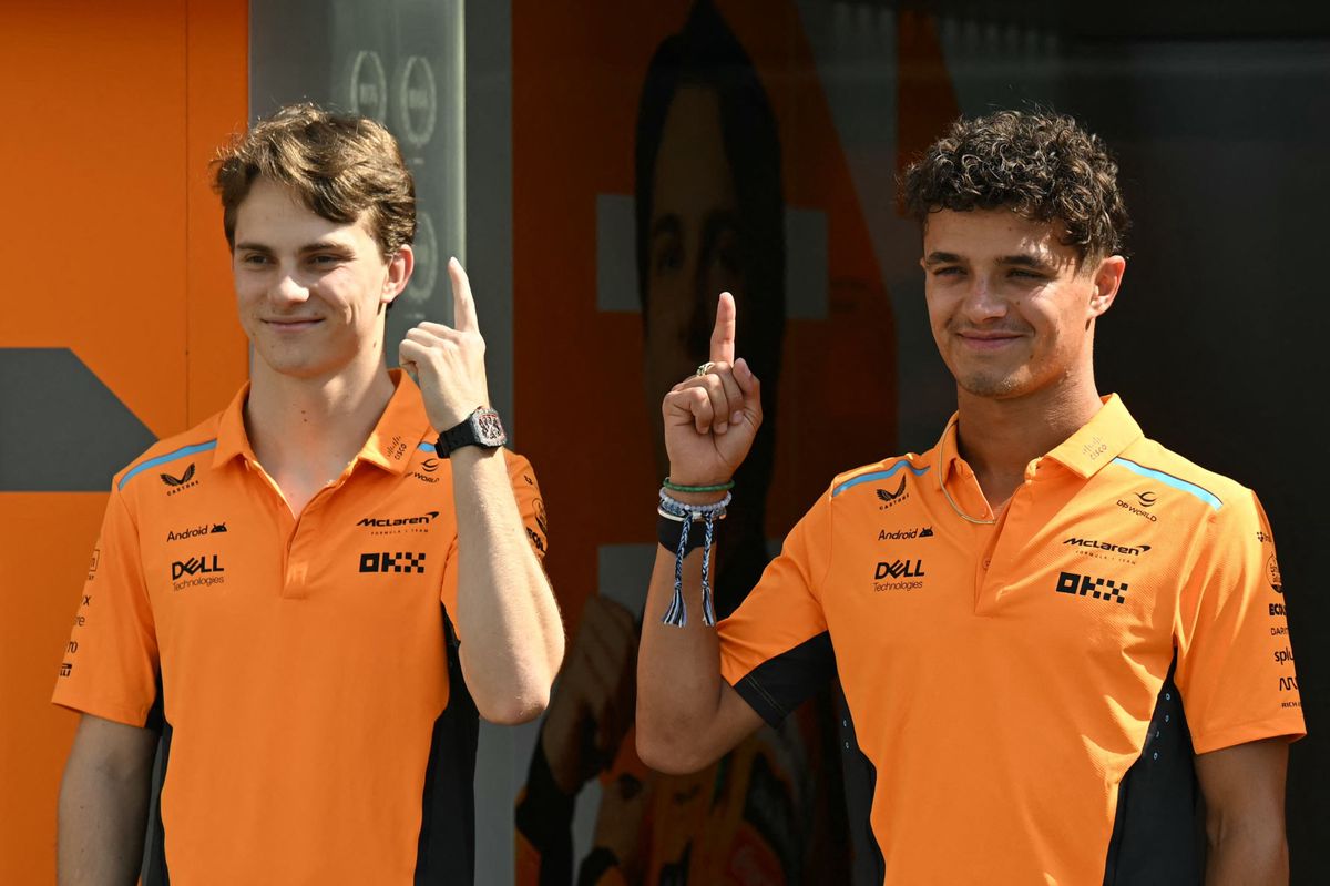 McLaren's Australian driver Oscar Piastri (L) and McLaren's British driver Lando Norris pose ahead of the Formula One Azerbaijan Grand Prix in Baku on September 12, 2024. (Photo by Natalia KOLESNIKOVA / AFP)