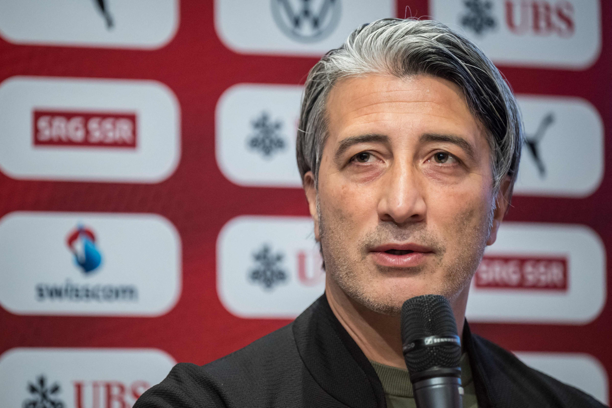 Switzerland's national football team head coach Murat Yakin gives a press conference in Lausanne, on May 17, 2024, after unveiling Swiss squad for the UEFA Euro 2024 football tournament. (Photo by Fabrice COFFRINI / AFP)