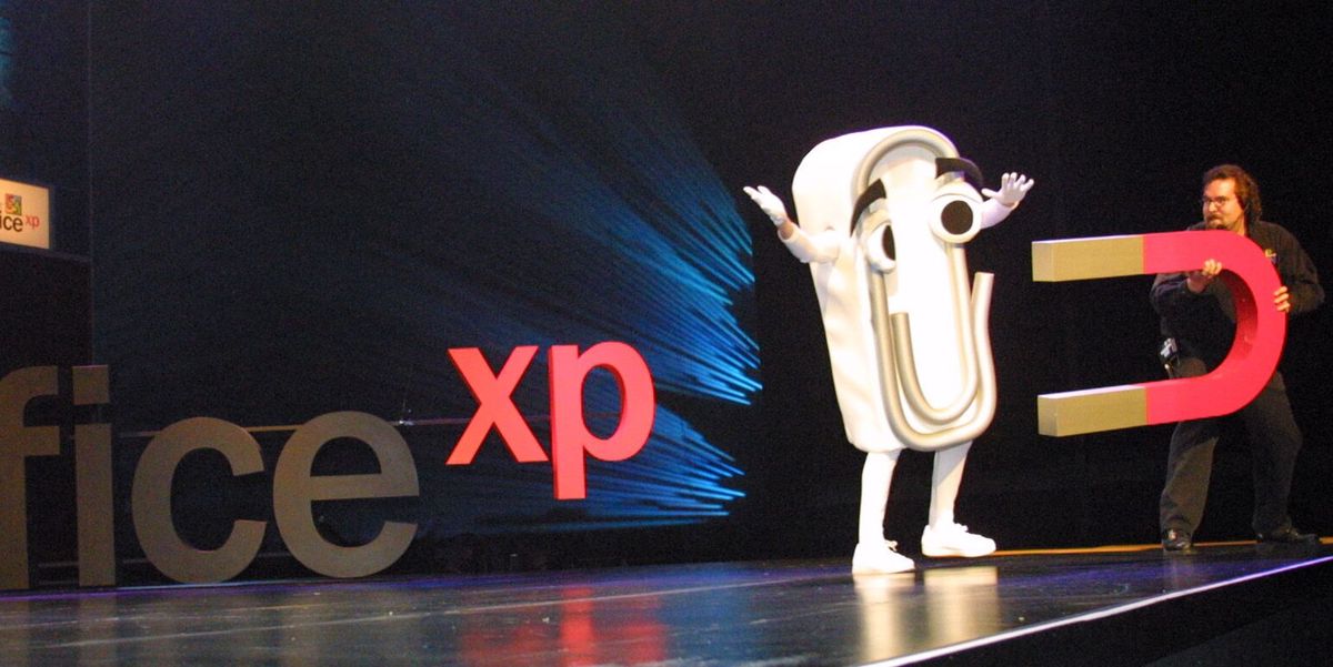 "Clippy," the Microsoft office help function that never made it to the final version, is sucked off the stage by a magnet during the announcement of Microsoft Office XP in New York City on Thursday, May 31, 2001. Photographer: Rick Maiman. Bloomberg News.