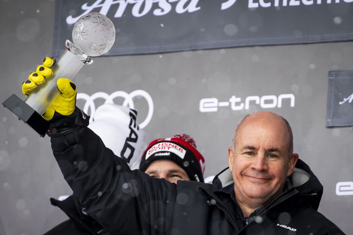 Johan Eliasch, Chairman of the Management Board of the HEAD group celebrates on the podium at the FIS Alpine Skiing World Cup finals, in Parpan-Lenzerheide, Switzerland, Sunday, March 21, 2021. (KEYSTONE/Jean-Christophe Bott)