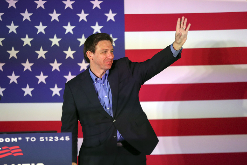 Republican presidential candidate Florida Gov. Ron DeSantis waves to his supporters as he takes the stage during a campaign event, Friday, June 2, 2023, in Lexington, S.C. (AP Photo/Artie Walker Jr.)