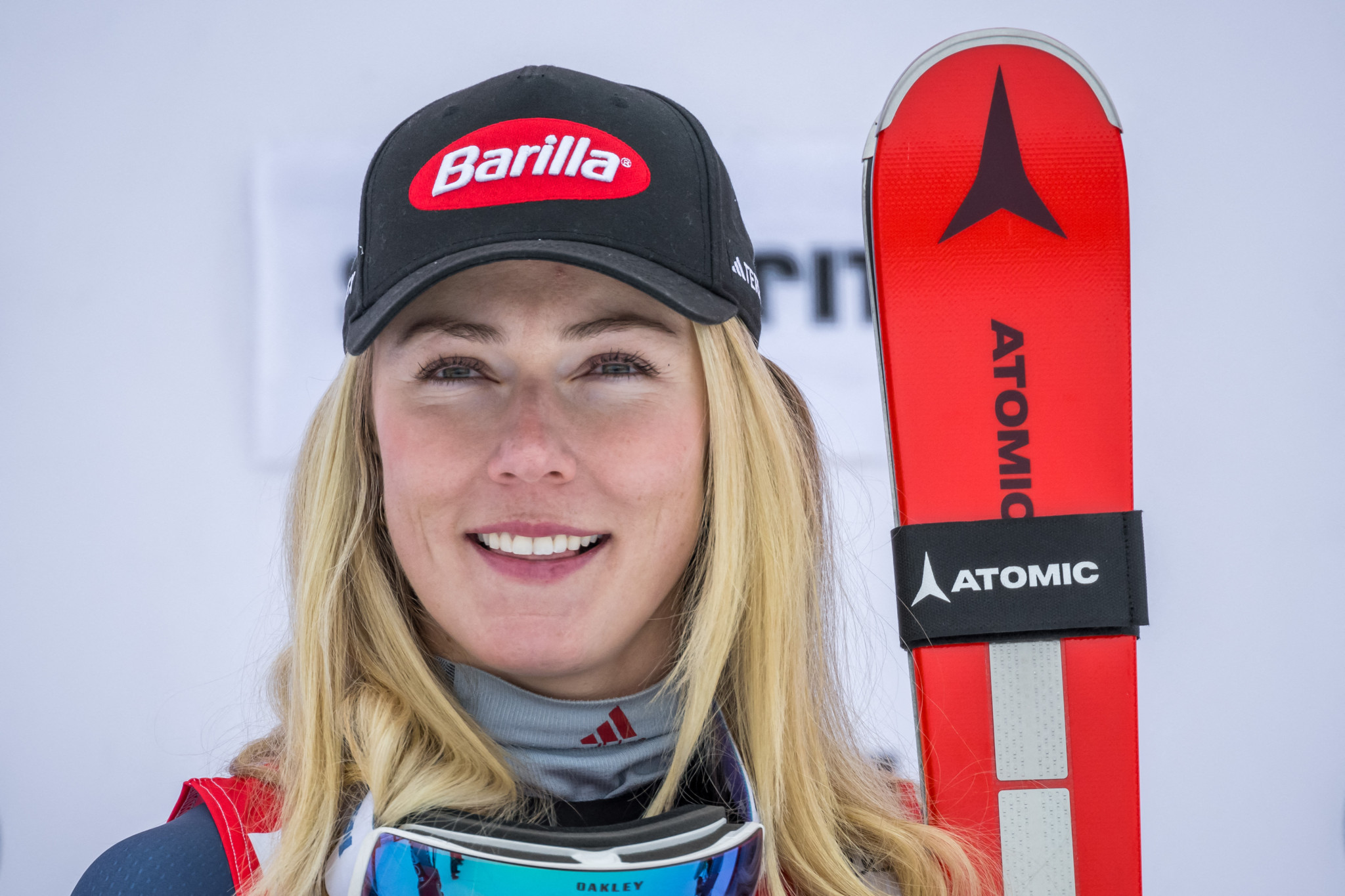 Winner US skier Mikaela Shiffrin reacts during the podium ceremony of the Women's Downhill race at the FIS Alpine Skiing World Cup event in St. Moritz, Switzerland, on December 9, 2023. (Photo by Fabrice COFFRINI / AFP)